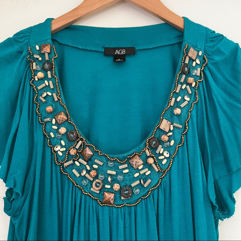 Turquoise tee with beading